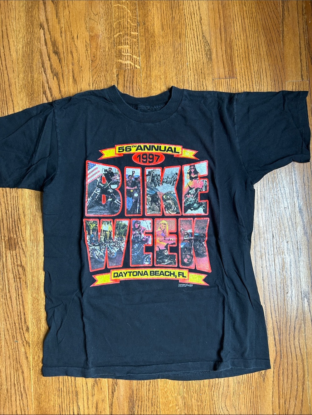 Harley-Davidson Black Tee with Red and Yellow Bike Week Graphic